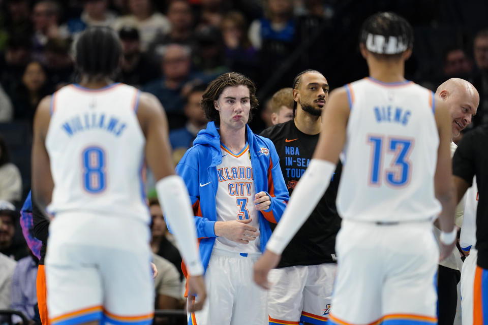 Oklahoma City Thunder guard Josh Giddey (3) stands on the court during a timeout in the first half of an NBA basketball In-Season Tournament game against the Minnesota Timberwolves, Tuesday, Nov. 28, 2023, in Minneapolis. (AP Photo/Abbie Parr)