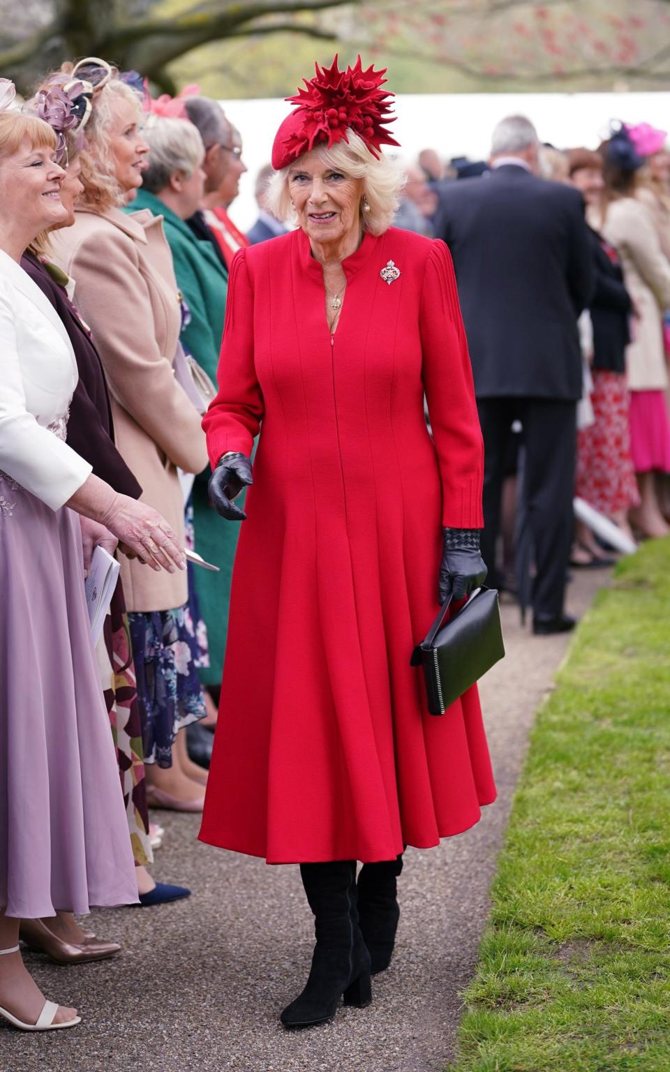 Camilla, The Queen Consort, Colonel, Grenadier Guards is seen meeting guests after a ceremony where King Charles III presented new Standards and Colours to the Royal Navy