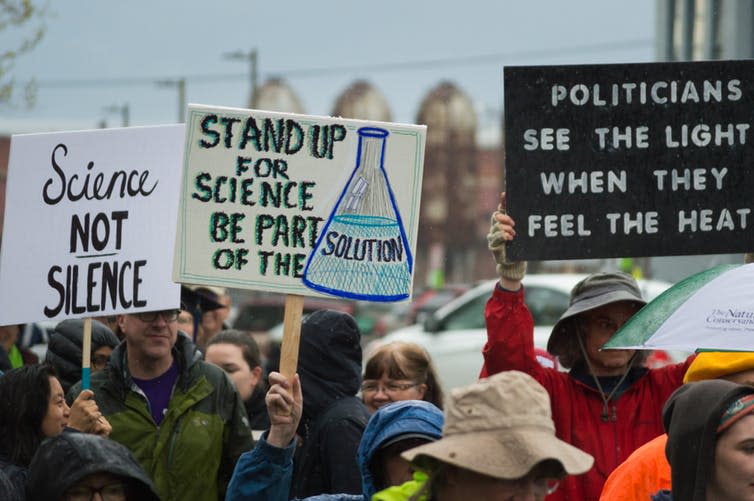 <span class="caption">Protesters challenge the suppression of climate change research by President Trump.</span> <span class="attribution"><a class="link " href="https://www.shutterstock.com/image-photo/bellingham-washington-usa-april-22-2017-626067023?src=7dRLMAOWLMdRTrTKmUeHIg-1-7" rel="nofollow noopener" target="_blank" data-ylk="slk:www.shutterstock.com;elm:context_link;itc:0;sec:content-canvas">www.shutterstock.com</a></span>