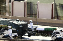 The convoy carrying the coffin of former Algerian President Abdelaziz Bouteflika drives on its way to the El Alia cemetery in Algiers, Sunday, Sept.19, 202. Algeria's leader declared a three-day period of mourning starting Saturday for former President Abdelaziz Bouteflika, whose 20-year-long rule, riddled with corruption, ended in disgrace as he was pushed from power amid huge street protests when he decided to seek a new term. Bouteflika, who had been ailing since a stroke in 2013, died Friday at 84. (AP Photo/Fateh Guidoum)