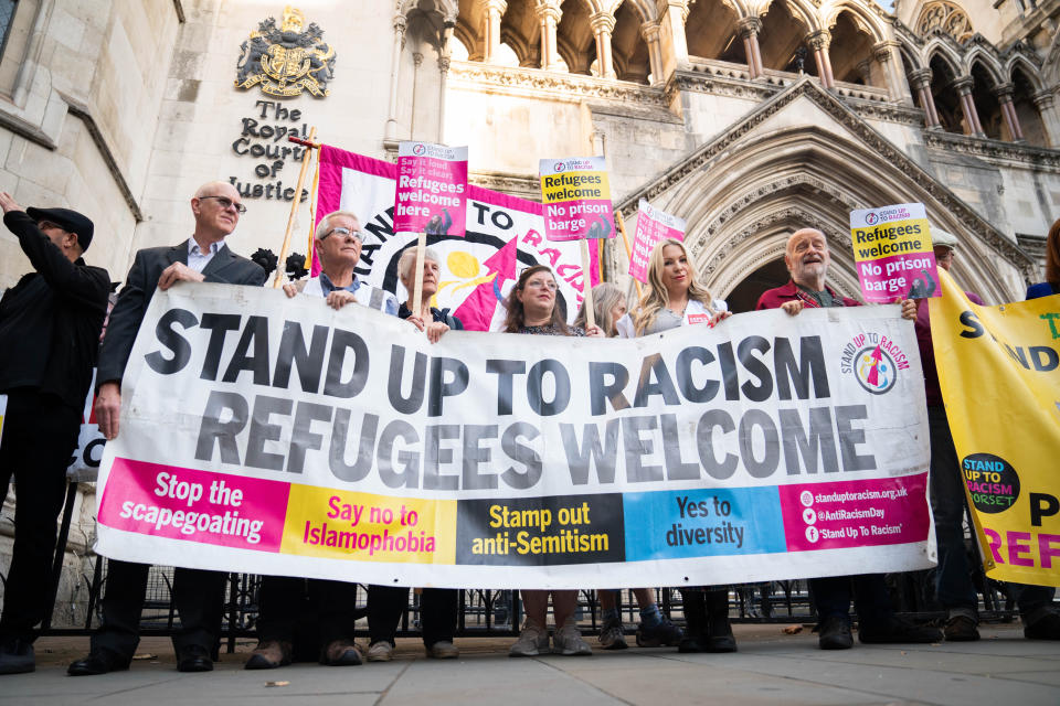 Dorset residents and supporters of Carralyn Parkes, outside the Royal Courts Of Justice in London, ahead of her legal challenge against the Home Office over the planned use of Bibby Stockholm in Dorset to house asylum seekers. Parkes, who lives on the Isle of Portland, is bringing legal action against the department over the use of the barge docked in Portland Port. Picture date: Tuesday October 10, 2023. PA Photo. See PA story COURTS BibbyStockholm. Photo credit should read: James Manning/PA Wire