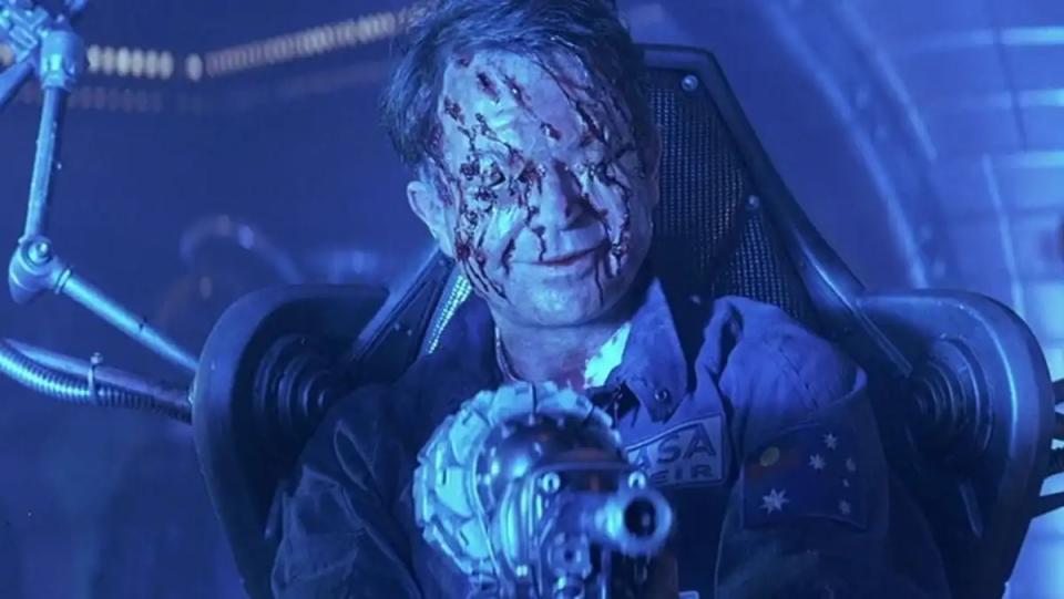 Sam Neill with a horribly scarred face in space horror flick Event Horizon.