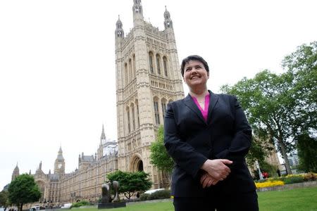 Ruth Davidson, the leader of the Conservative Party in Scotland, poses for photographers outside the Houses of Parliament in central London, Britain May 15, 2017. REUTERS/Stefan Wermuth