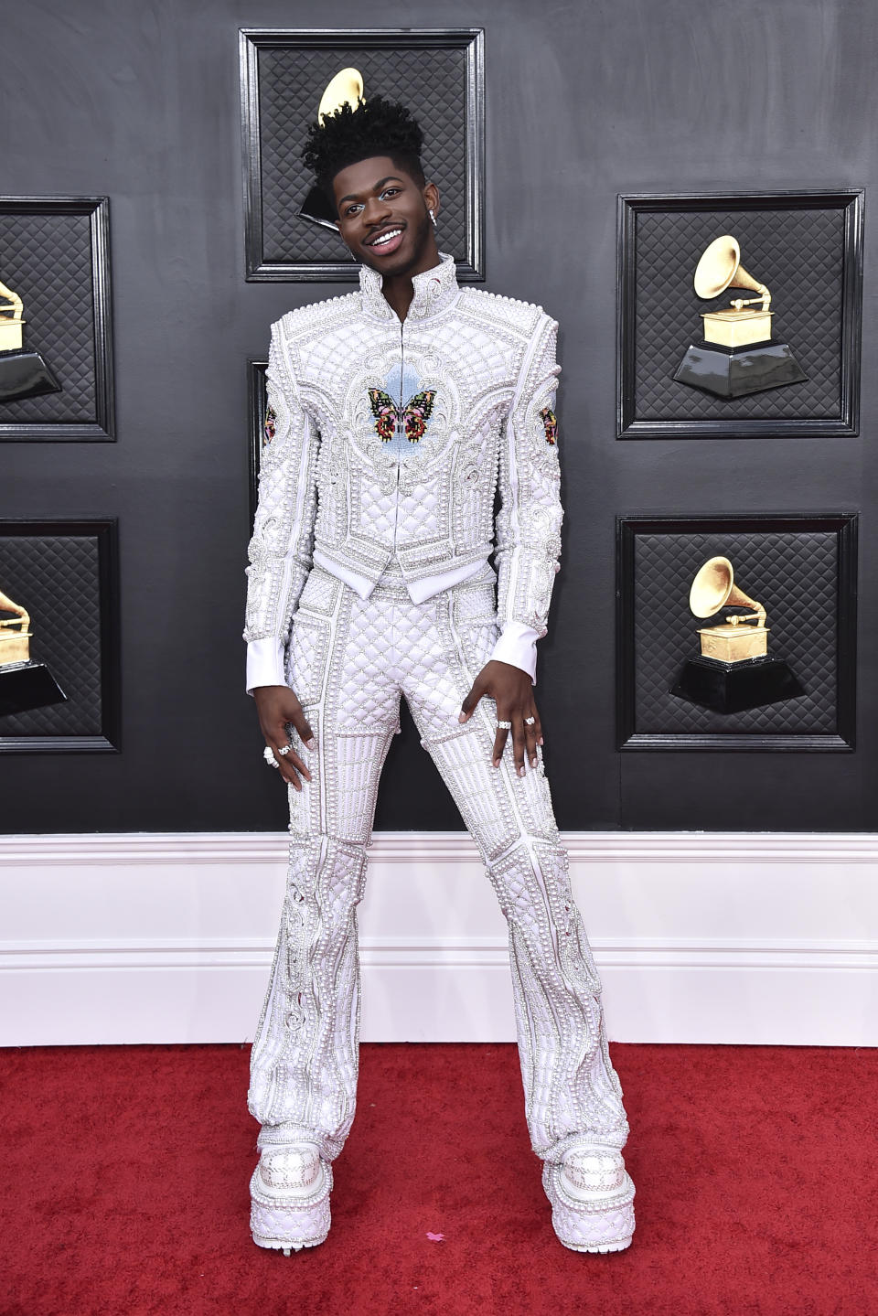 Lil Nas X arrives at the 64th Annual Grammy Awards at the MGM Grand Garden Arena on Sunday, April 3, 2022, in Las Vegas. (Photo by Jordan Strauss/Invision/AP)