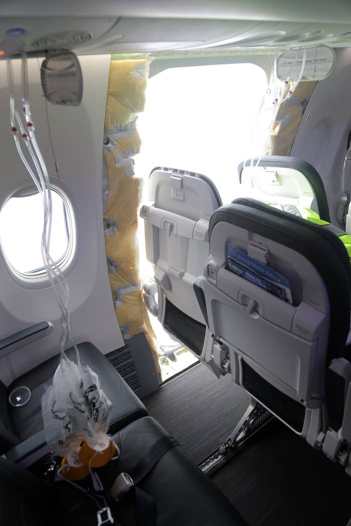 a ripped-out door on an Alaska Airlines flight