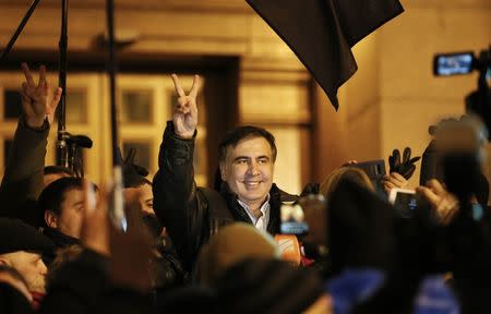 Ukrainian opposition figure and Georgian former President Mikheil Saakashvili (C) reacts after he was released from detention in Kiev, Ukraine December 11, 2017. REUTERS/Gleb Garanich