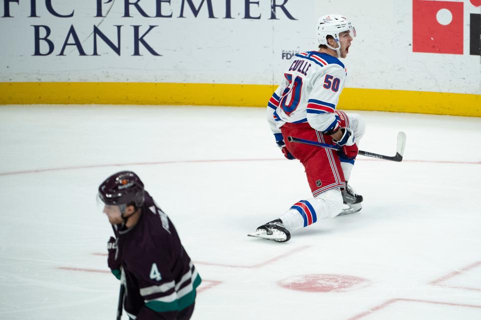 New York Rangers left wing Will Cuylle (50) celebrates after his goal during the third period of an NHL hockey game against the Anaheim Ducks, Sunday, Jan. 21, 2024, in Anaheim, Calif.