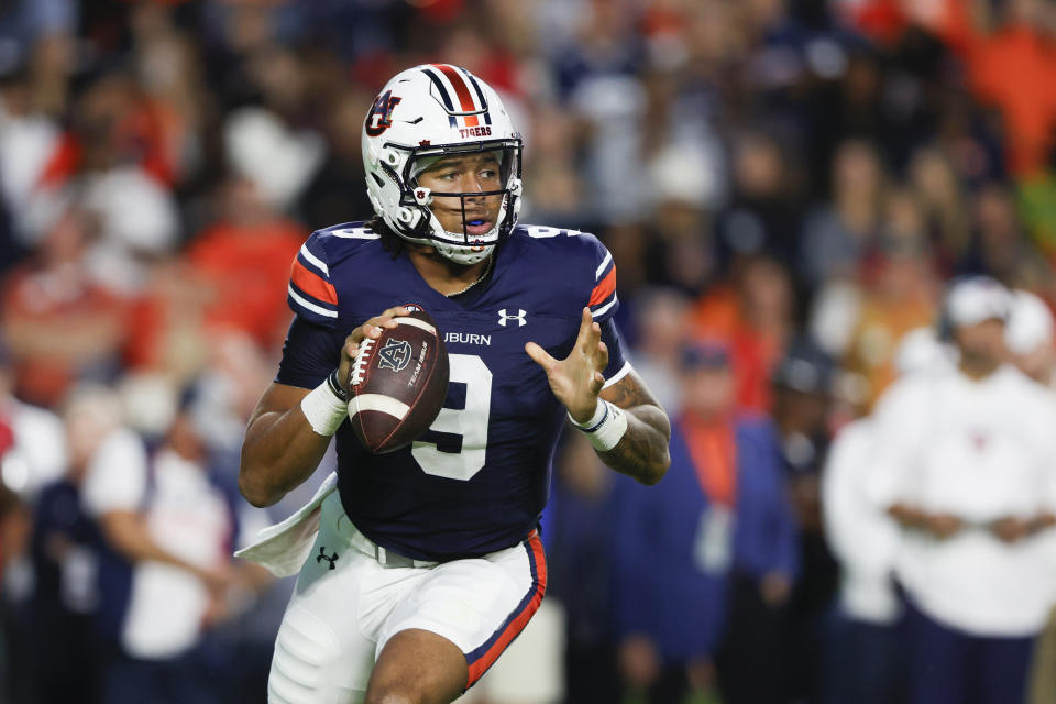 FILE - Auburn quarterback Robby Ashford throws a pass during the first half of an NCAA college football game against Mississippi, Saturday, Oct. 21, 2023, in Auburn, Ala. South Carolina coach Shane Beamer and the Gamecocks have spent spring ball concentrating on those on the field, not those who left. That includes former Auburn quarterback Ashford, who started 10 games in two years with the Tigers, to go along with highly regarded sophomore LaNorris Sellers, a five-star prospect who learned behind Rattler a season ago. (AP Photo/Butch Dill, File)