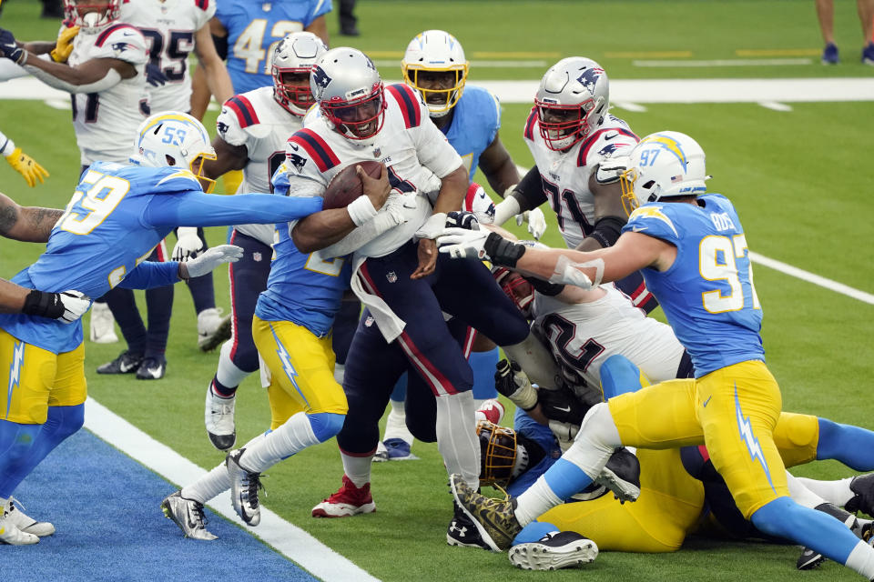 New England Patriots quarterback Cam Newton gets into the end zone for a rushing touchdown during the first half of an NFL football game against the Los Angeles Chargers Sunday, Dec. 6, 2020, in Inglewood, Calif. (AP Photo/Ashley Landis)