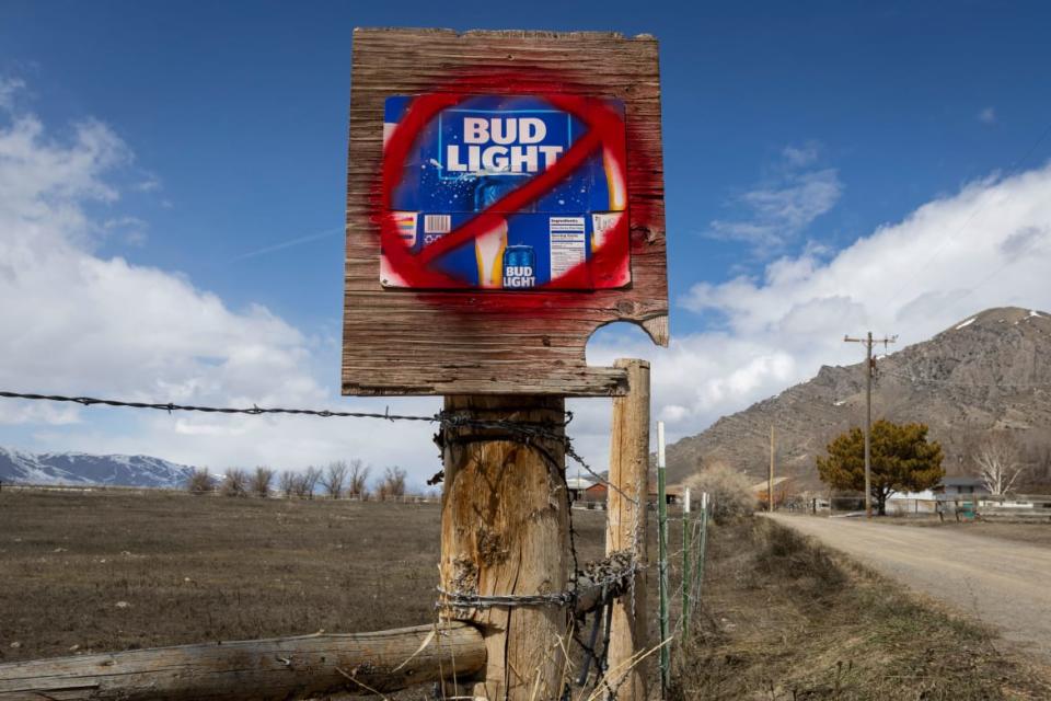 <div class="inline-image__caption"><p>A sign disparaging Bud Light beer on a country road on April 21, 2023, in Arco, Idaho. Anheuser-Busch, the brewer of Bud Light, has faced backlash after the company sponsored two Instagram posts from a transgender woman.</p></div> <div class="inline-image__credit">Natalie Behring/Getty Images</div>