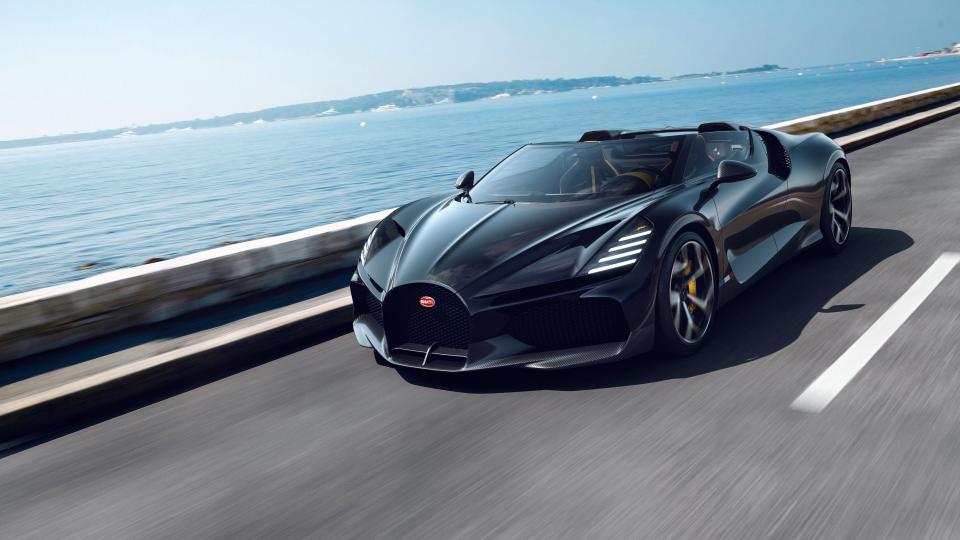 <p>Meet the Bugatti W16 Mistral. It's an open-top roadster meant to act as the sendoff for the company's legendary W-16 engine. The unit here, shared with the Chiron Super Sport 300+, powers all four wheels via a dual-clutch transaxle. Just 99 units will be built, each with a starting price of roughly $5.1 million. To no one's surprise, the W16 Mistral is already sold out. </p><p><a class="link " href="https://www.roadandtrack.com/new-cars/a40919386/bugatti-mistral/" rel="nofollow noopener" target="_blank" data-ylk="slk:Read the full story right here;elm:context_link;itc:0;sec:content-canvas">Read the full story right here</a></p>