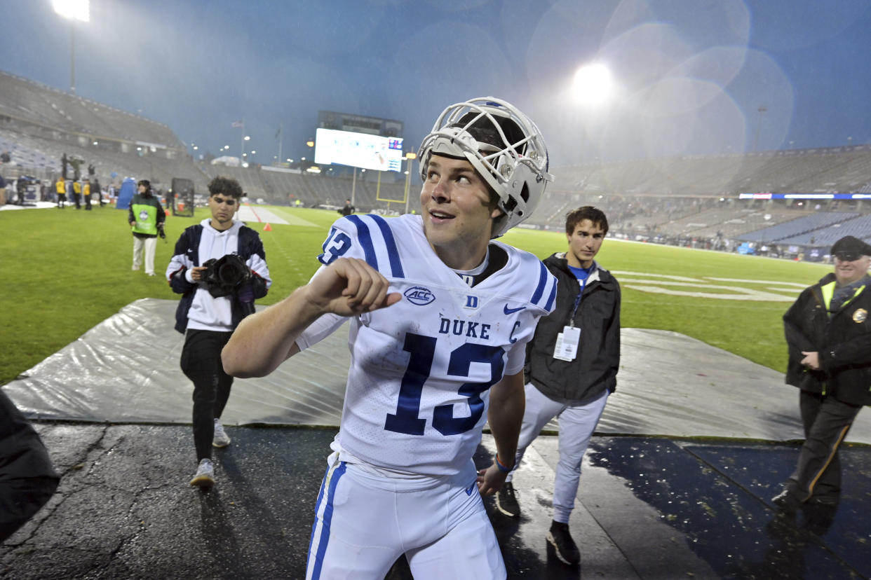 Duke quarterback Riley Leonard (13) reacts to fans after their victory over UConn on Saturday, Sept. 23, 2023, in Hartford, Conn. (AP Photo/Josh Reynolds)