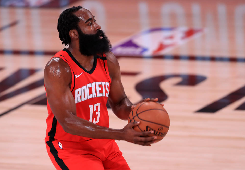 James Harden #13 of the Houston Rockets shoots the ball against the Oklahoma City Thunder during the first quarter in Game Six of the Western Conference First Round during the 2020 NBA Playoffs at AdventHealth Arena.