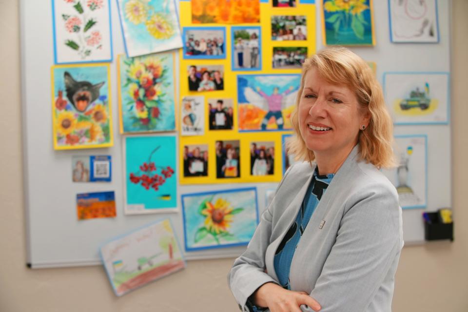 Heather A. Conley, president of the German Marshall Fund, reacts to a display of Ukrainian youth artwork during a tour on Tuesday at the University of Oklahoma Health Sciences Center.