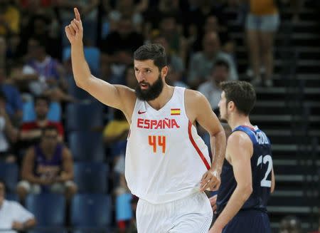 2016 Rio Olympics - Basketball - Quarterfinal - Men's Quarterfinal Spain v France - Carioca Arena 1 - Rio de Janeiro, Brazil - 17/8/2016. Nikola Mirotic (ESP) of Spain celebrates a basket against France. REUTERS/Jim Young