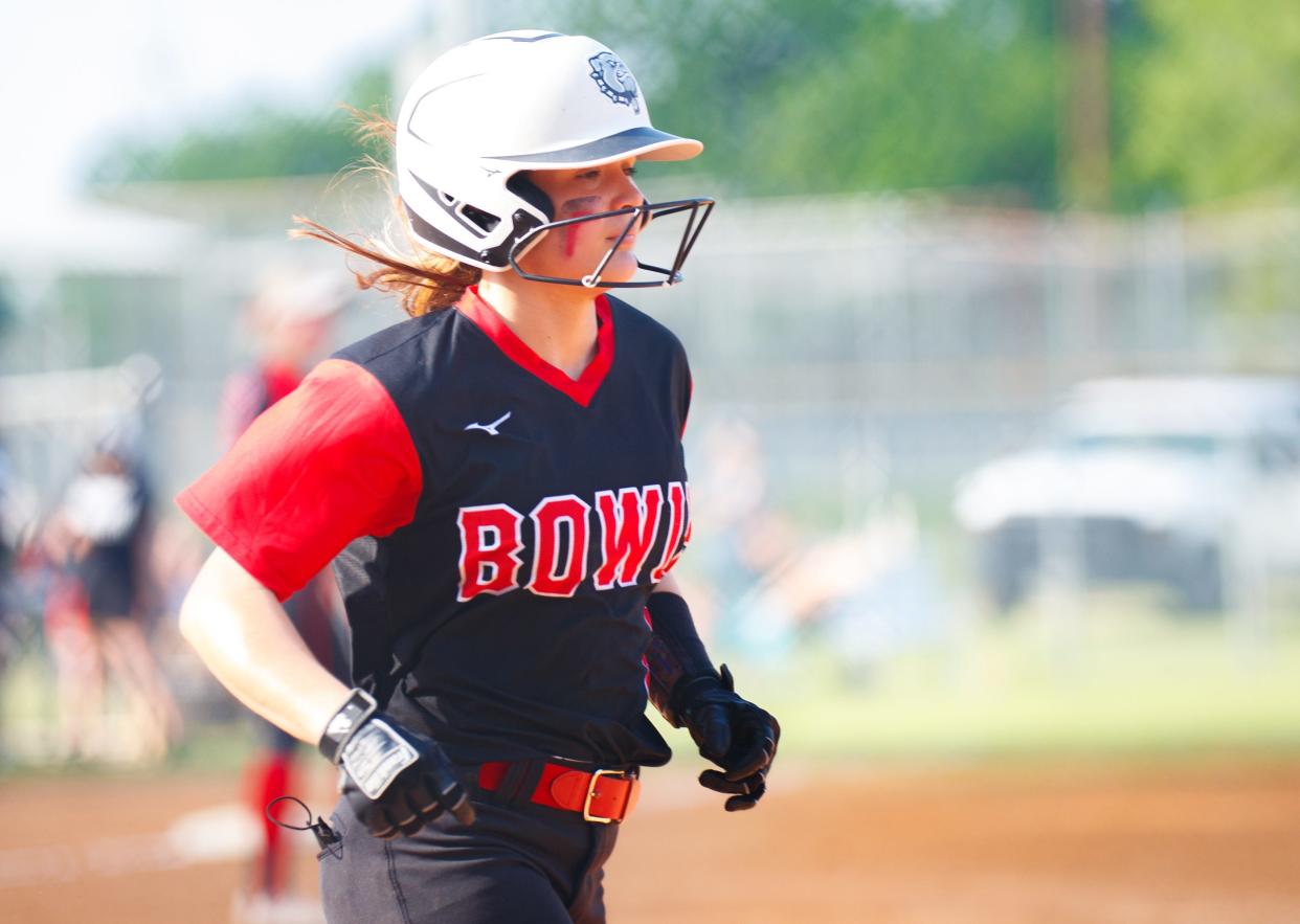 Bowie's Olivia Moreno trots to first base after a walk in a game against Vista Ridge last season. Moreno, who returned to the Bulldog team this week after winning a wrestling state title, hit for the cycle while driving in six runs in a win over San Marcos.