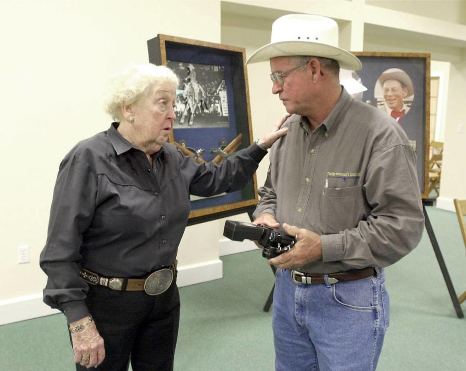 Famed cowgirl Faye Blackstone of Parrish talks with Culley Rowell in 2001 during the Palmetto Heritage Festival’s dedication of the Palmetto Agricultural Museum.