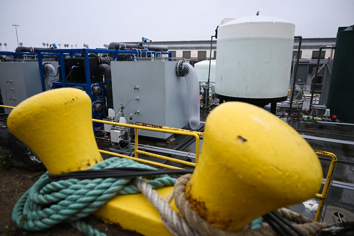 Equipment on a barge for UCLA's SeaChange climate change carbon removal project at the Port of Los Angeles in San Pedro, California on April 12, 2023. - Floating in the port of Los Angeles, a strange-looking barge covered with pipes and tanks contains a concept that scientists hope to make waves: a new way to use the ocean as a vast carbon dioxide sponge to tackle global warming.
Scientists from University of California Los Angeles (UCLA) have been working for two years on SeaChange -- an ambitious project that could one day boost the amount of CO2, a major greenhouse gas, that can be absorbed by our seas. (Photo by Patrick T. Fallon / AFP) (Photo by PATRICK T. FALLON/AFP via Getty Images)