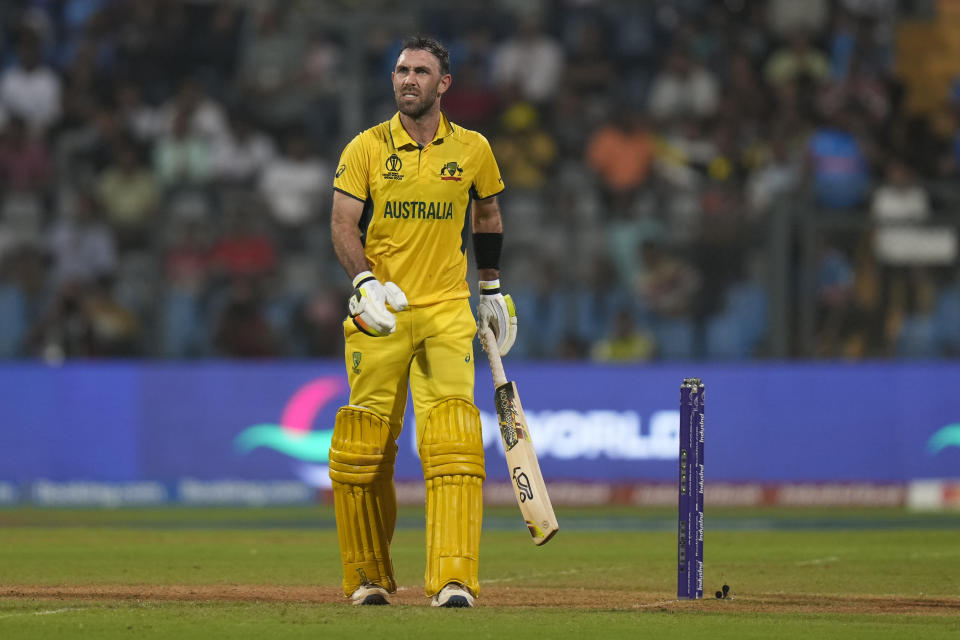 Australia's Glenn Maxwell reacts in pain due to cramps during the ICC Men's Cricket World Cup match between Australia and Afghanistan in Mumbai, India, Tuesday, Nov. 7, 2023. (AP Photo/Rajanish Kakade)