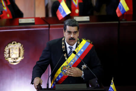 Venezuela's President Nicolas Maduro gestures as he speaks during a ceremony to mark the opening of the judicial year at the Supreme Court of Justice (TSJ) in Caracas, Venezuela February 14, 2018. REUTERS/Marco Bello