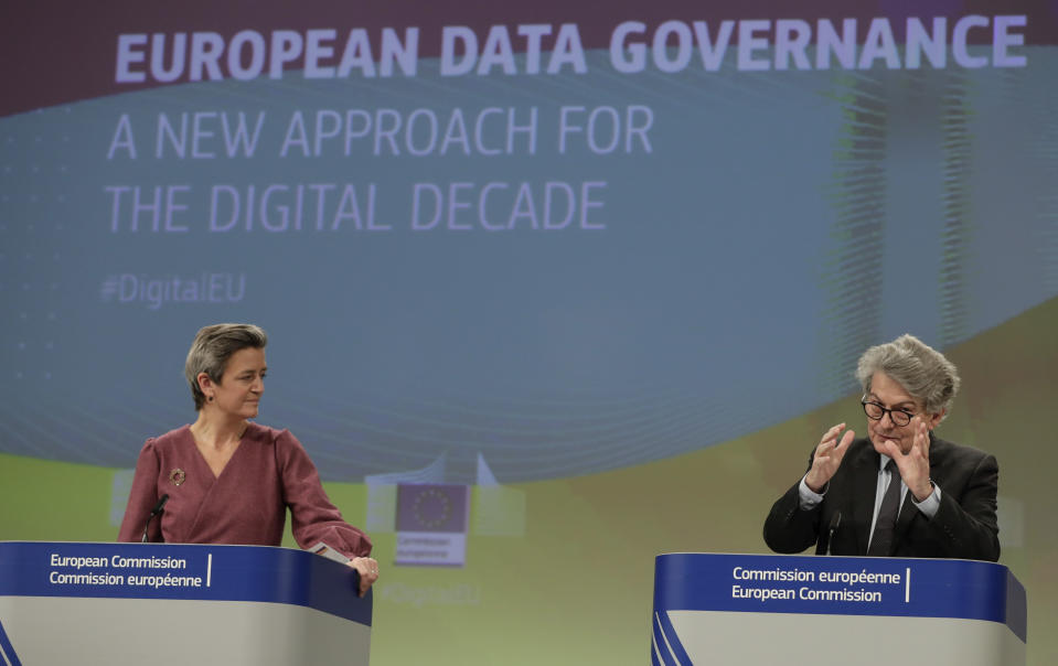 European Commissioner for Europe fit for the Digital Age Margrethe Vestager, left, and European Commissioner for Internal Market Thierry Breton participate in a media conference on European Data Governance at EU headquarters in Brussels, Wednesday, Nov. 25, 2020. (Stephanie Lecocq, Pool via AP)