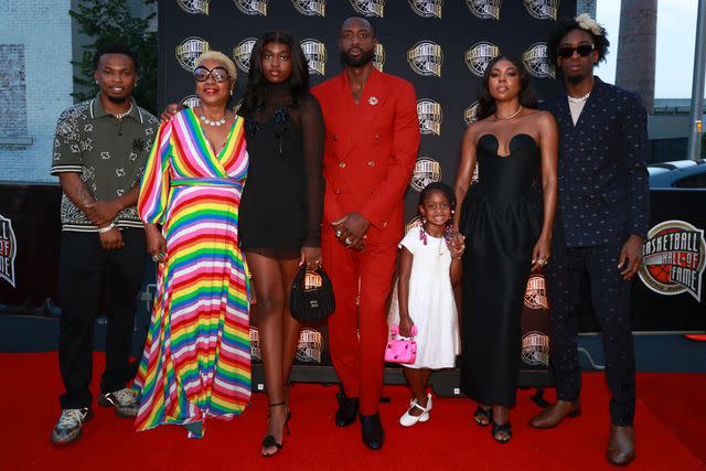 <p>Mike Lawrie/Getty</p> Dahveon Morris, Jolinda Wade, Zaya Wade, Dwyane Wade, Kaavia James Wade, Gabrielle Union and Zaire Wade in August 2023