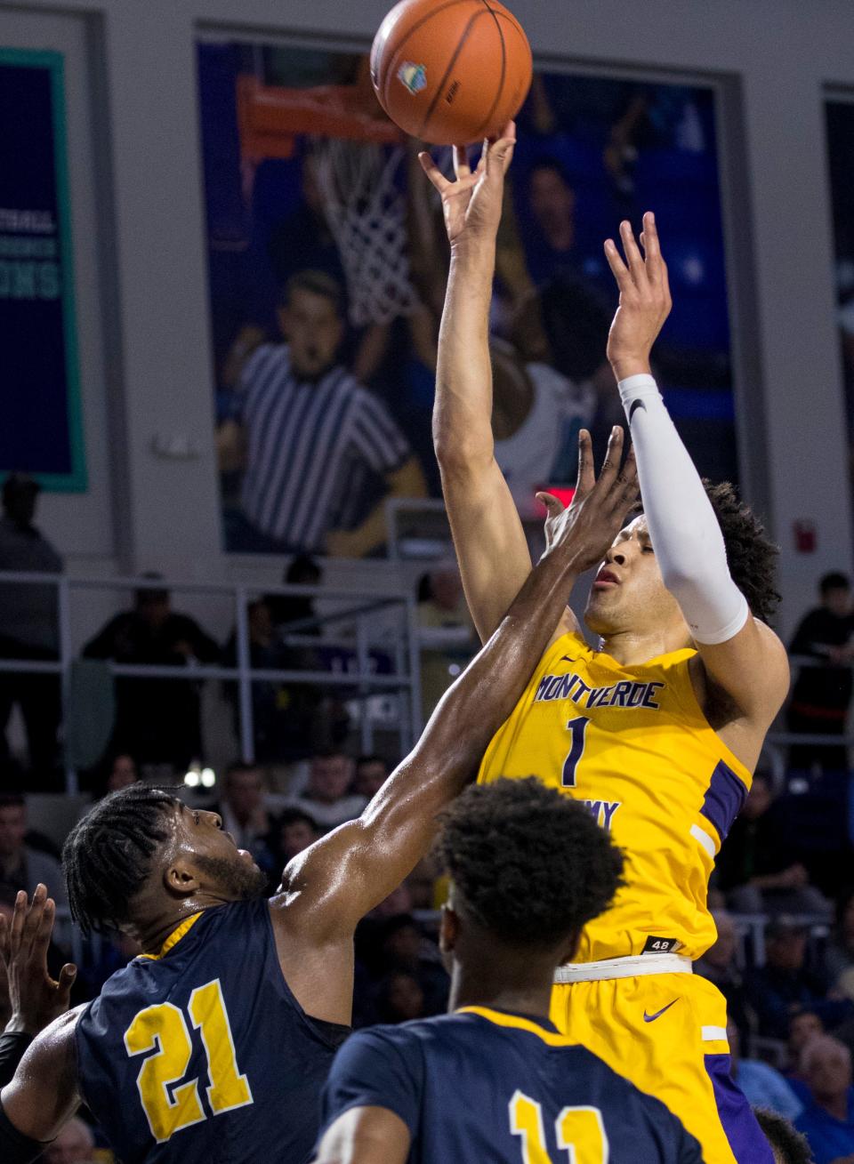 Cade Cunningham of Montverde Academy takes a shot as Nnanna Njoku of Sanford School guards him in the 2019 City of Palms Classic on Thursday, Dec. 19, 2019, at Suncoast Credit Union Arena in Fort Myers. 