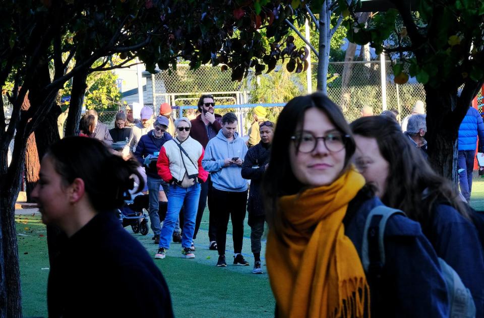 <span class="caption">Voters line up in Melbourne on election day.</span> <span class="attribution"><span class="source">Luis Ascui/AAP</span></span>