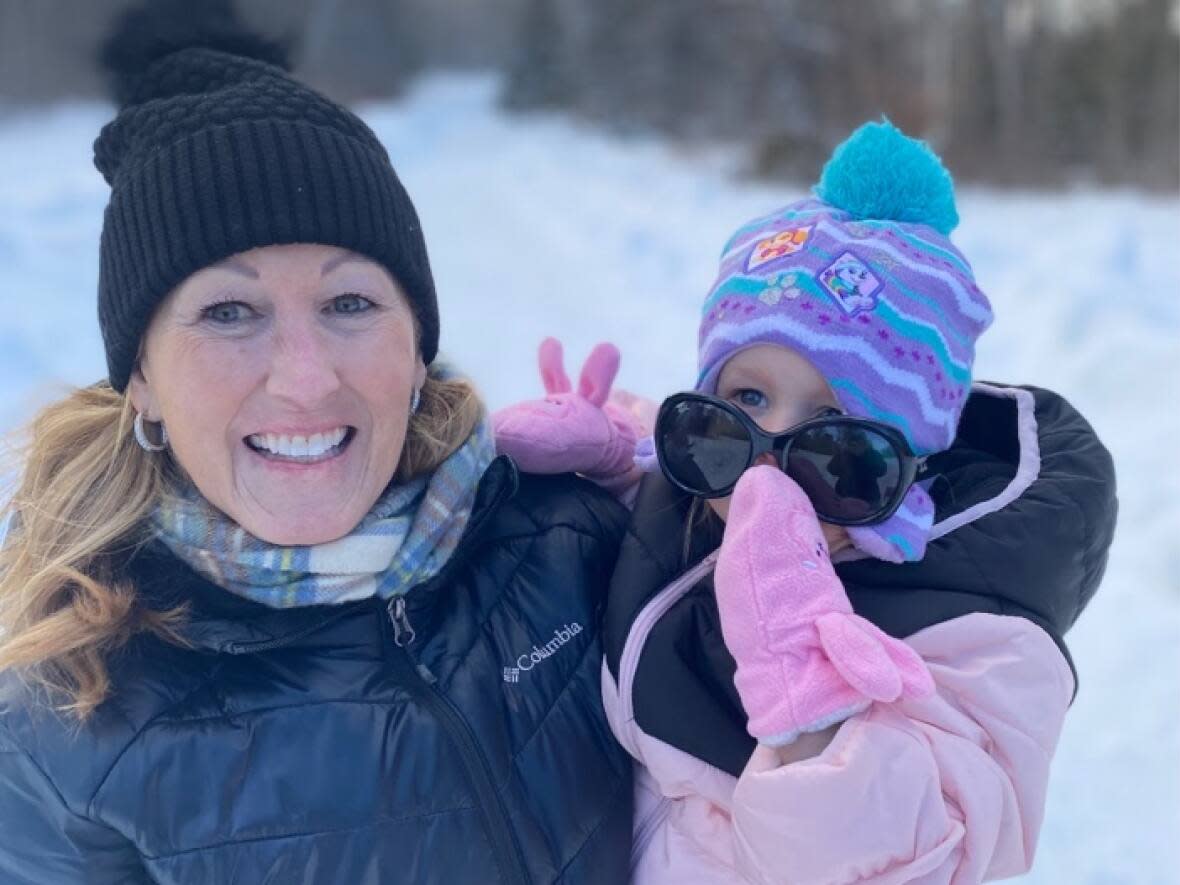 Janet Robinson holds her beloved granddaughter Lennon, who inspired her children's book about grandmotherhood. (Submitted by Janet Robinson - image credit)