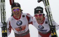 Canada's gold medalists Alex Harvey (R) and Devon Kershaw (L) celebrate winning the Men's Team Sprint Classic event at the Nordic Skiing World Championships in Oslo, ON March 2, 2011. AFP PHOTO/DANIEL SANNUM LAUTEN (Photo credit should read DANIEL SANNUM LAUTEN/AFP/Getty Images)