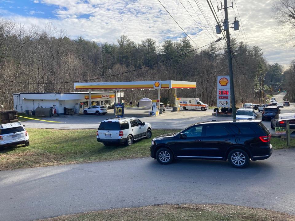 The Buncombe County Sheriff's Office investigated the deaths of two people at a gas station on Mills Gap Road on Dec. 19, 2022.