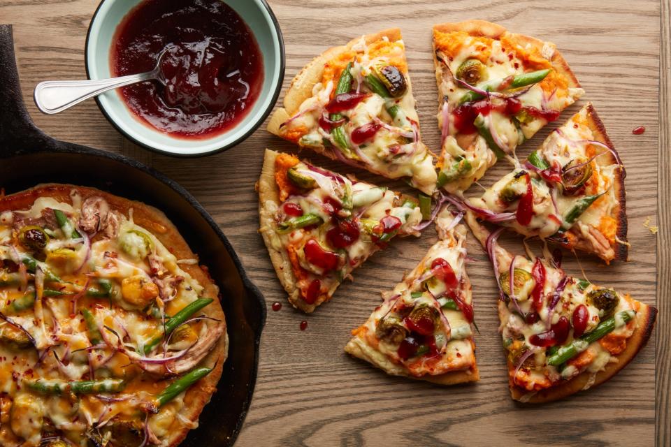 Cranberry sauce takes the place of tomato sauce in this post-Thanksgiving pizza.