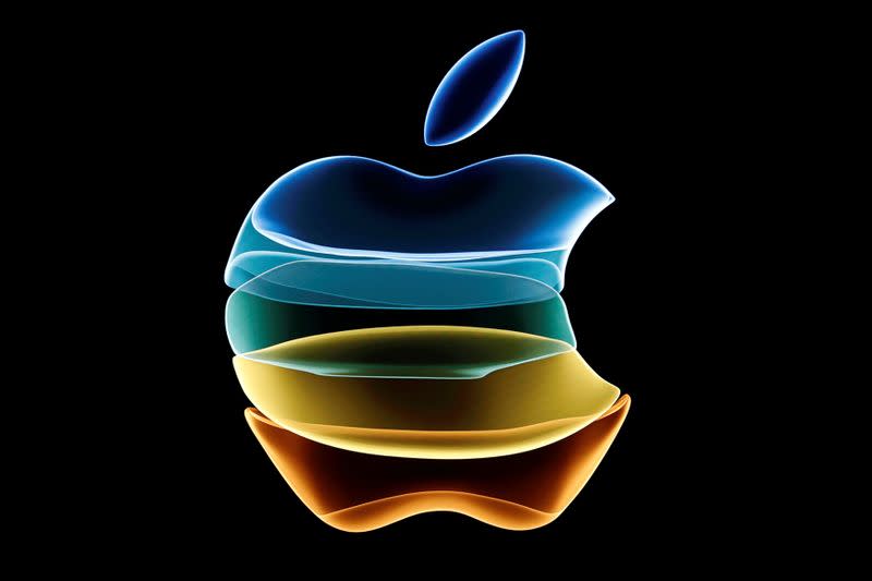 FILE PHOTO: The Apple logo is displayed at an event at their headquarters in Cupertino