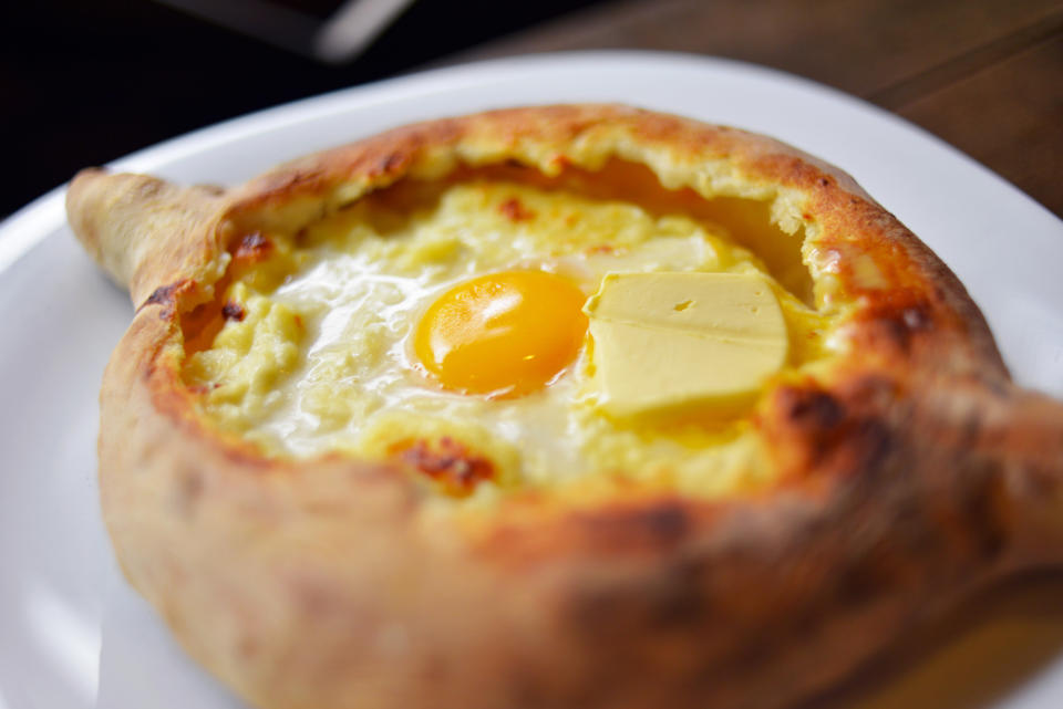 Adjaruli khachapuri, a Georgian bread bowl with raw egg