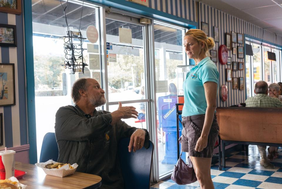 Kristine (Laura Linney) is wary of Paul (Woody Harrelson), a right-to-life activist befriended by her teen daughter, in the coming-of-age movie "Suncoast."