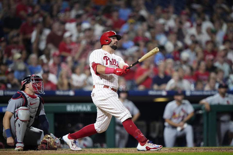 Philadelphia Phillies' Kyle Schwarber watches after hitting a home run against St. Louis Cardinals pitcher Andrew Suarez during the seventh inning of a baseball game, Friday, Aug. 25, 2023, in Philadelphia. (AP Photo/Matt Slocum)