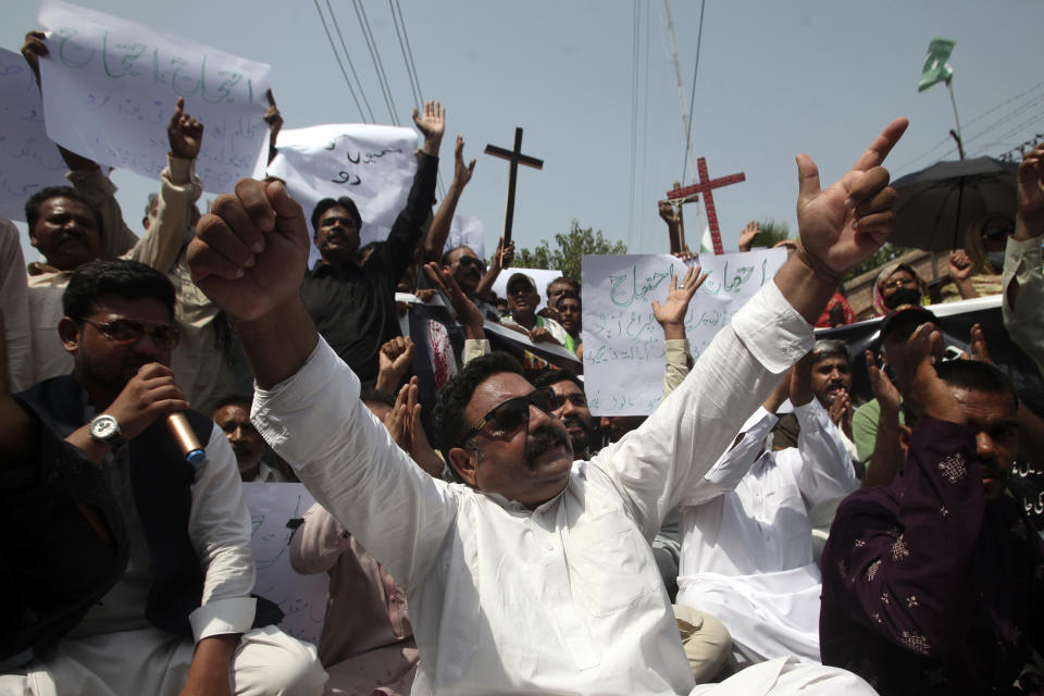 Pakistani Christians hold a demonstration condemning the recent attack on a Christian area by an angry Muslim mob, In Peshawar, Pakistan, Sunday, Aug. 20, 2023. (AP Photo/Mohammad Sajjad)