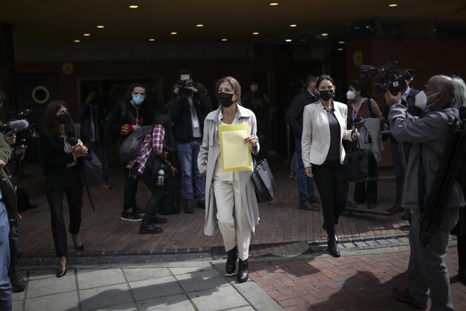 Former Colombian presidential candidate Ingrid Betancourt, who was abducted while campaigning by the Revolutionary Armed Forces of Colombia rebels, leaves Chapinero Theater after participating in an event at the Truth Commission to commemorate victims of the country’s decades-long armed conflict, in Bogota, Colombia, Wednesday, June 23, 2021. (AP Photo/Ivan Valencia)