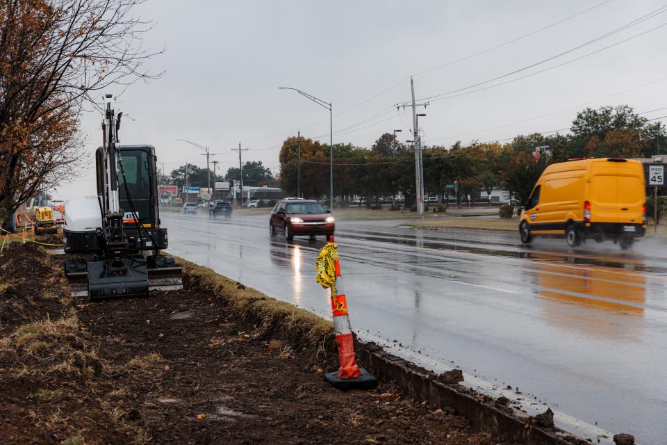 Rain delays ODOT's U.S. Highway 75 sidewalk construction project near Morgan Avenue in Bartlesville Tuesday.