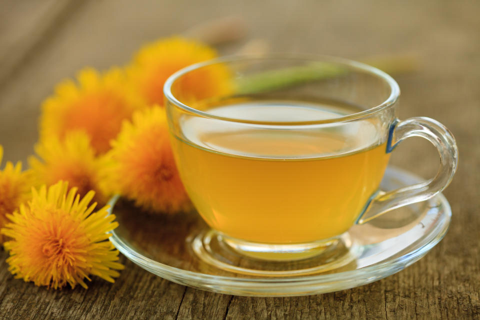 Dandelion tea cleanses the liver, which over time can help clear your skin. (Photo: Getty Images) 