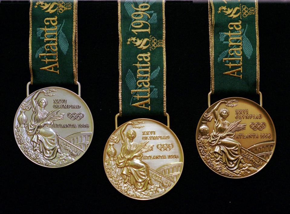 <p>A set of the Atlanta 1996 Olympic gold, silver, and bronze medals. (Susan Walsh/AP) </p>