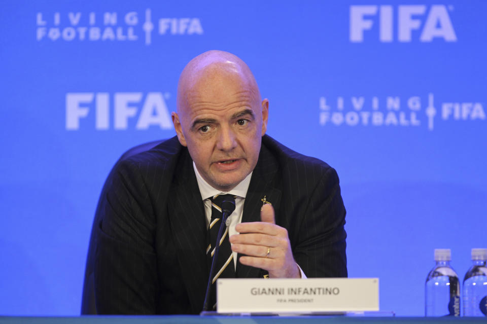 FIFA President Gianni Infantino talks during a press conference after a FIFA Council Meeting, Friday, March 15, 2019, in Miami. The council approved working with Qatar to explore expanding the 2022 World Cup to 48 teams by adding at least one more country in the Persian Gulf to host matches. (AP Photo/Luis M. Alvarez)