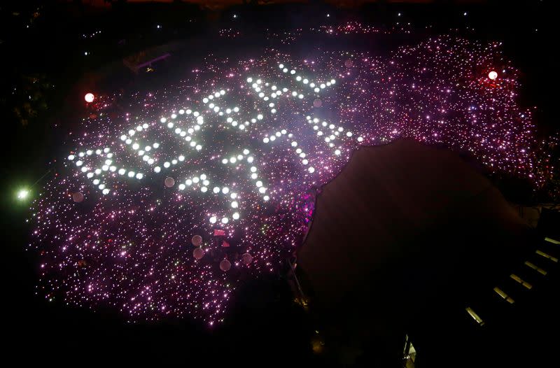 FILE PHOTO: Participants of Pink Dot, an annual event organised in support of the LGBT community, gather in a formation protesting the repeal of Section 377A of Singapore's Penal Code, at the Speakers' Corner in Hong Lim Park in Singapore