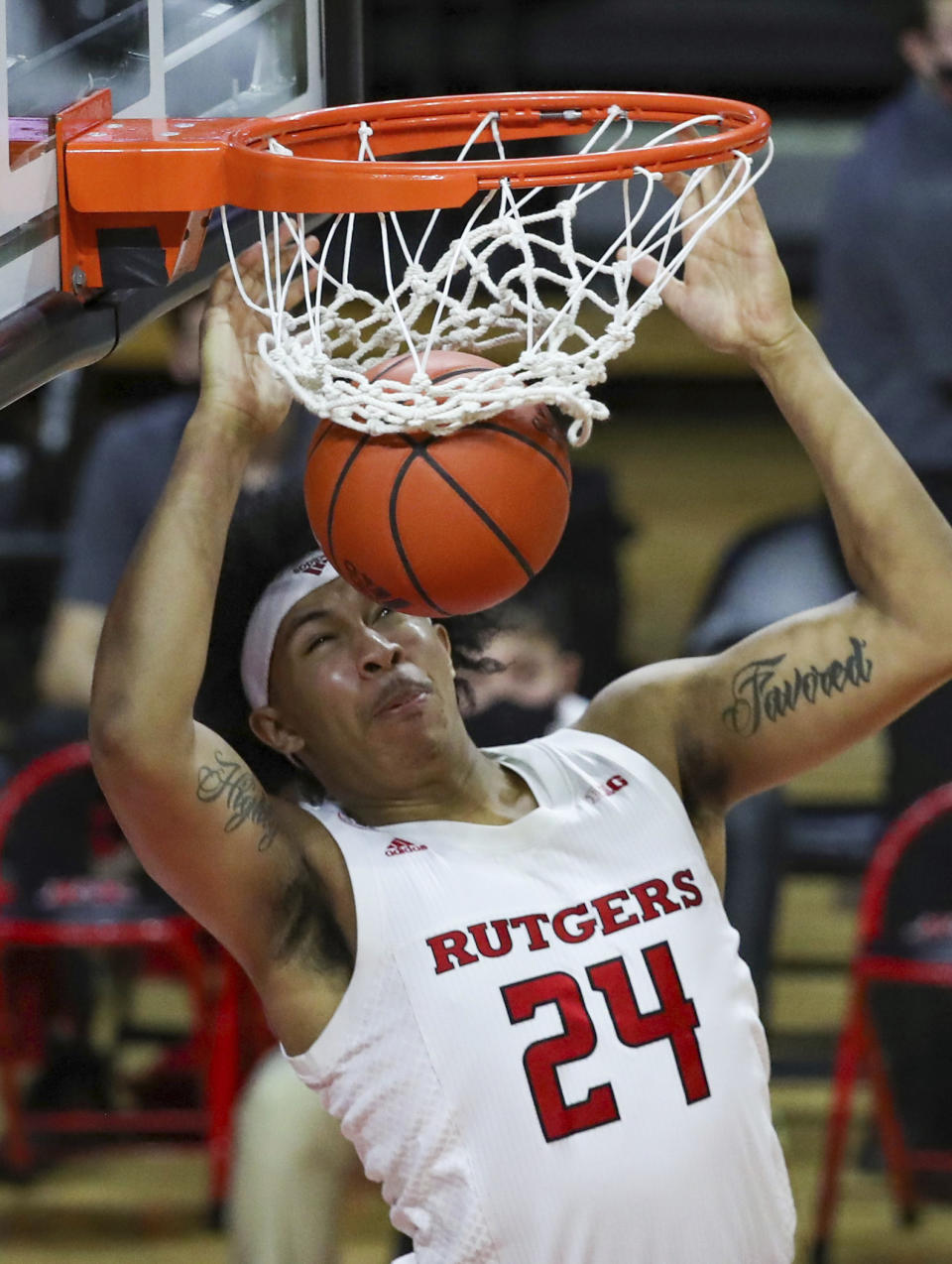 Rutgers guard Ron Harper Jr. dunks during the second half of the team's NCAA college basketball game against Minnesota on Thursday, Feb. 4, 2021, in Piscataway, N.J. (Andrew Mills/NJ Advance Media via AP)