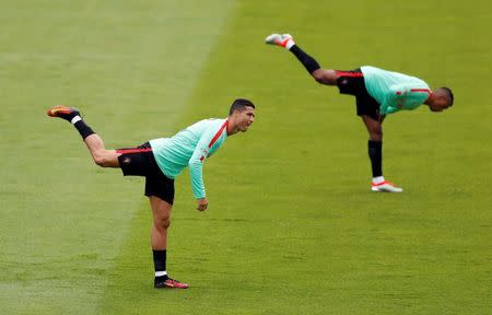 Football Soccer - Euro 2016 - Portugal Training - Centre National de Rugby, Marcoussis, France - 28/6/16 - Portugal's Cristiano Ronaldo and Nani during training. REUTERS/John Sibley