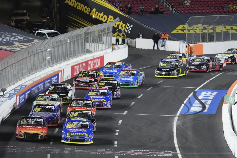 Cars race drives during the NASCAR Mexico Series auto race at Los Angeles Memorial Coliseum Saturday, Feb. 3, 2024, in Los Angeles. (AP Photo/Mark J. Terrill)