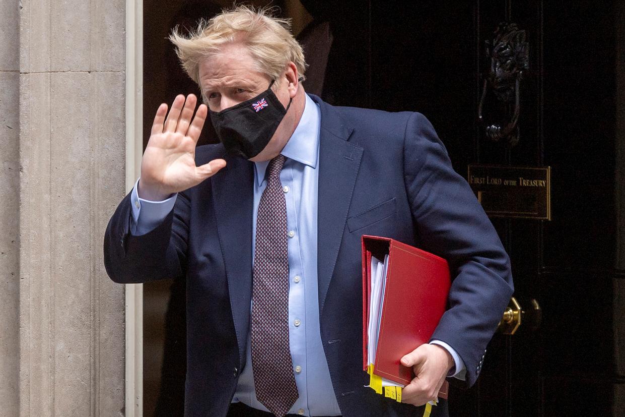 British Prime Minister Boris Johnson leaves 10 Downing Street for the Prime Minister's Questions at the House of Commons in London, Britain, on May 26, 2021. Earlier Wednesday, Dominic Cummings, former top adviser of the British prime minister, said that thousands of people died unnecessarily because of the British government's failings and Boris Johnson was 