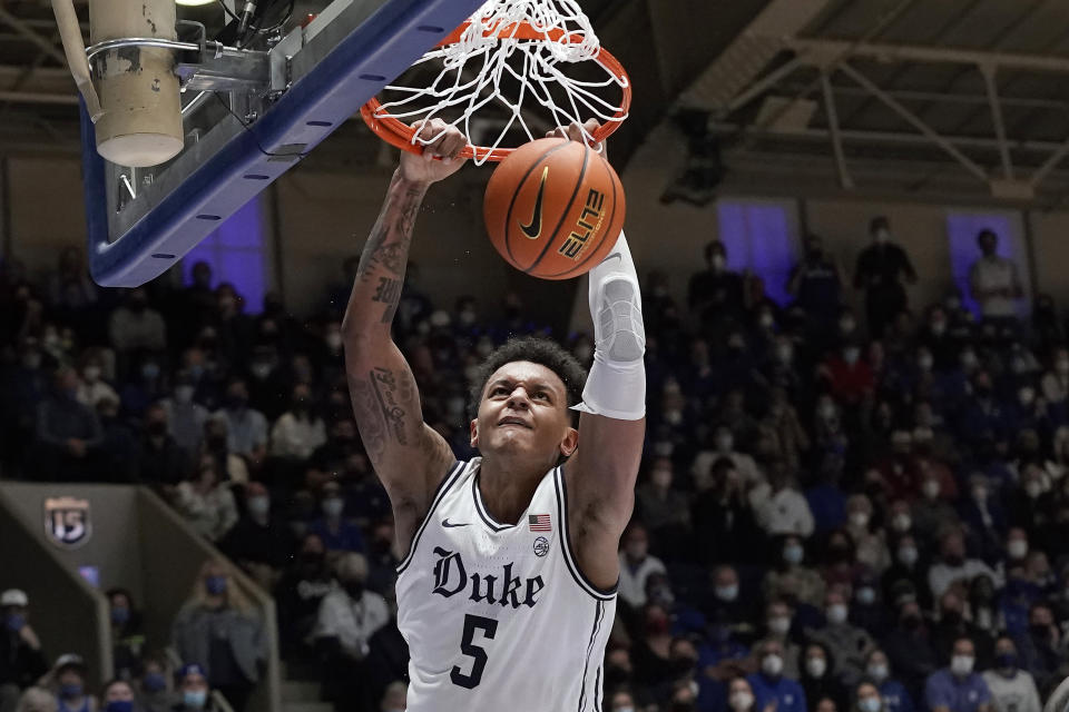 Duke forward Paolo Banchero (5) dunks against North Carolina State during the second half of an NCAA college basketball game in Durham, N.C., Saturday, Jan. 15, 2022. (AP Photo/Gerry Broome)