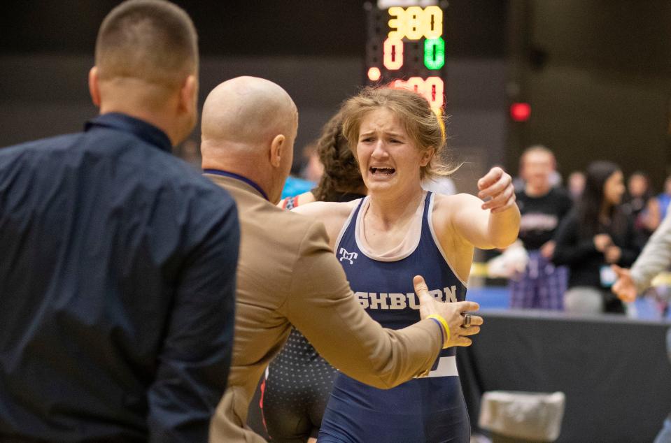 Washburn Rural's Addison Broxterman said she's not a crier, but couldn't help but celebrate after winning third place at the 6-5A girls state wrestling tournament.