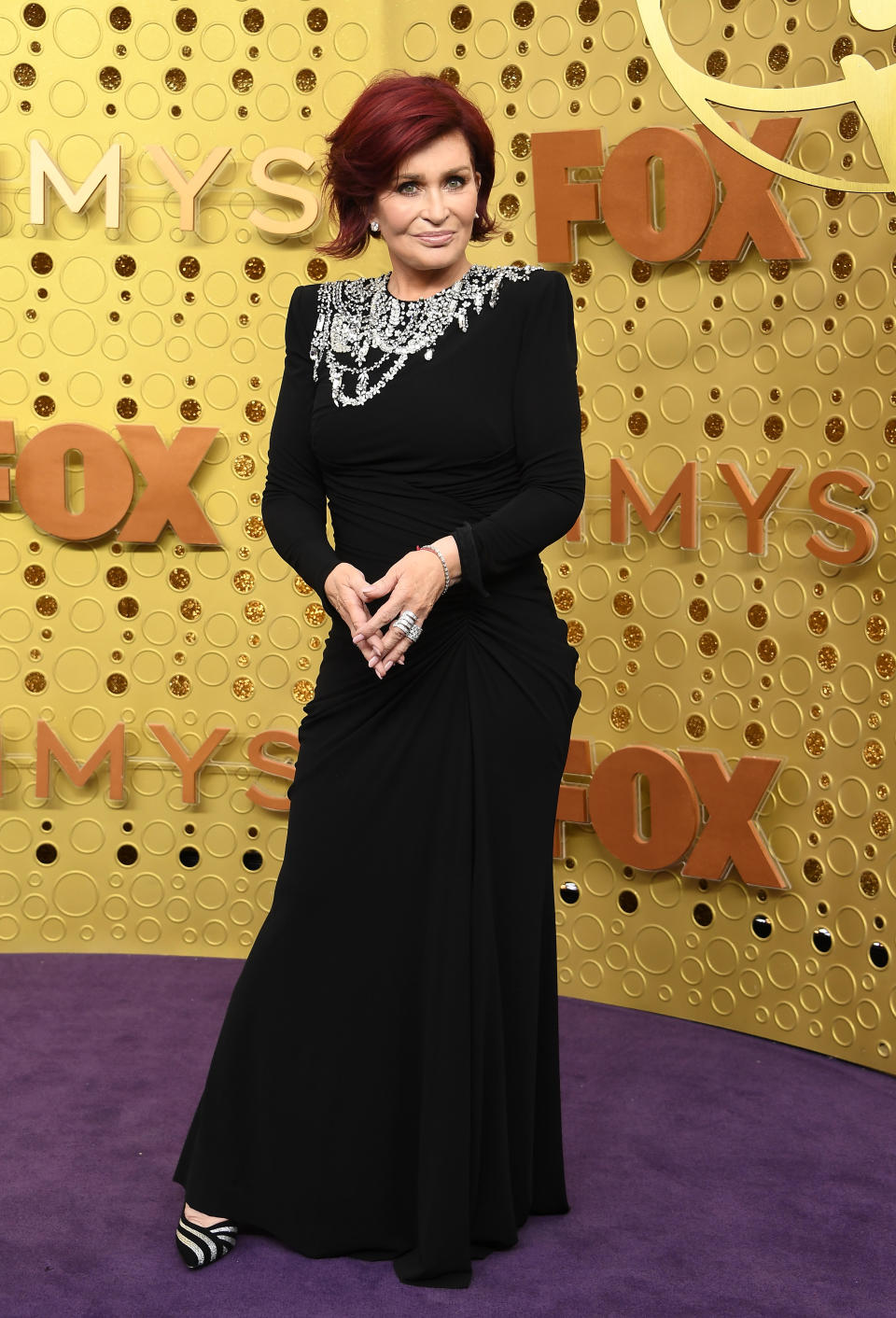 'The Talk' daytime host and infamous reality-TV mom looked elegant in an embellished black gown by Alexander McQueen. [Photo: Getty]